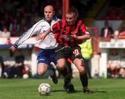 30 April 2000; Garreth O'Connor of Bohemians in action against Paul Doolan of Shelbourne during the FAI Cup Final match between Shelbourne and Bohemians at Tolka Park in Dublin. Photo by Brendan Moran/Sportsfile