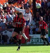 30 April 2000; Owen Heary of Shelbourne in action against Paul Byrne of Bohemians during the FAI Cup Final match between Shelbourne and Bohemians at Tolka Park in Dublin. Photo by Matt Browne/Sportsfile