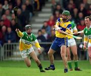 2 April 2000; Fergus Flynn of Clare in action against Brendan Murphy of Offaly during the Church & General National Hurling League Division 1A Round 5 match between Offaly and Clare at St Brendan's Park in Birr, Offaly. Photo by Damien Eagers/Sportsfile