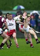 29 April 2000; Joe Bergin of Galway in action against Cormac McAnallen of Tyrone during the All-Ireland Under 21 Football Championship Semi-Final match between Galway and Tyrone at Páirc Seán Mac Diarmada in Carrick-On-Shannon, Leitrim. Photo by Damien Eagers/Sportsfile