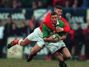 31 March 2000. Geordan Murphy of Ireland is tackled by Delme Williams of Wales during the Six Nations A Rugby Championship match between Ireland and Wales at Donnybrook Stadium in Dublin. Photo by Matt Browne/Sportsfile