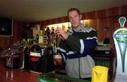 14 April 2000;  Meath footballer Graham Geraghty pulls a pint at his pub The Swan Inn in Coolronan, Meath. Photo by David Maher/Sportsfile