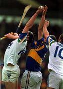 16 April 2000; Anthony Kirwan, left, and Dan Shanahan of Waterford in action against Philip Maher of Tipperary during the Church & General National Hurling League Division 1B Round 7 match between Waterford and Tipperary at Walsh Park in Waterford. Photo by Matt Browne/Sportsfile