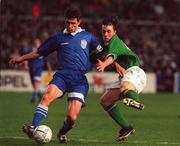26 April 2000; Marinos Ouzounidis of Greece in action against David Connolly of Republic of Ireland during the International Friendly match between Republic of Ireland and Greece at Lansdowne Road in Dublin. Photo by Matt Browne/Sportsfile