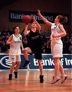8 February 2000; Irene Codd of Scoil Ruain Killenaule in action against Neasa Cunniffe, left, and Catherine Shallow of Loreto Foxrock during the Bank of Ireland Schools Cup Girls' B Final match between Scoil Ruain Killenaule and Loreto Foxrock at National Basketball Arena in Tallaght, Dublin. Photo by Brendan Moran/Sportsfile