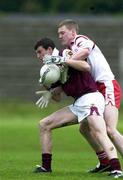 29 April 2000; Joe Bergin of Galway in action against Cormac McAnallen of Tyrone during the All-Ireland Under 21 Football Championship Semi-Final match between Galway and Tyrone at Páirc Seán Mac Diarmada in Carrick-On-Shannon, Leitrim. Photo by Damien Eagers/Sportsfile