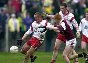 29 April 2000; Joe Campbell of Tyrone in action against Kieran Fitzgerald of Galway during the All-Ireland Under 21 Football Championship Semi-Final match between Galway and Tyrone at Páirc Seán Mac Diarmada in Carrick-On-Shannon, Leitrim. Photo by Damien Eagers/Sportsfile