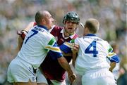 30 April 2000; Joe Rabbitte of Galway in action against Peter Queally, left, and Brian Flannery of Waterford during the Church & General National Hurling League Division 1 Semi-Final match between Galway and Waterford at Semple Stadium in Thurles, Tipperary. Photo by Ray McManus/Sportsfile