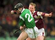 16 April 2000; John Cormican of Limerick in action against Finbar Gantley of Galway during the Church & General National Hurling League Division 1A Round 7 match between Limerick and Galway at the Gaelic Grounds in Limerick. Photo by Brendan Moran/Sportsfile
