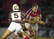 7 April 2000; John Langford of Munster is tackled by Fritz van Heerden Leicester Tigers during the friendly match between Leicester Tigers and Munster at Welford Road in Leicester, England. Photo by Brendan Moran/Sportsfile