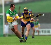 2 April 2000; Johnny Dooley of Offaly in action against Tony Griffin of Clare during the Church & General National Hurling League Division 1A Round 5 match between Offaly and Clare at St Brendan's Park in Birr, Offaly. Photo by Aoife Rice/Sportsfile