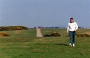 29 March 2000; Jockey Johnny Murtagh walking near his home at the Curragh in Newbridge, Kildare. Photo by Brendan Moran/Sportsfile