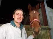 29 March 2000; Jockey Johnny Murtagh pictured with one of his horses at his home at the Curragh in Newbridge, Kildare. Photo by Brendan Moran/Sportsfile
