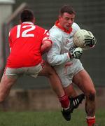 5 March 2000; Justin McNulty of Armagh in action against Brendan J. O'Sullivan of Cork during the Church & General National Football League Division 1A Round 5 match between Armagh and Cork at Crossmaglen Rangers GAC Club in Armagh. Photo by Damien Eagers/Sportsfile