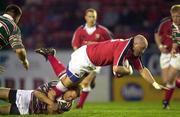 7 April 2000; Keith Wood of Munster is tackled by Pat Howard of Leicester Tigers during the friendly match between Leicester Tigers and Munster at Welford Road in Leicester, England. Photo by Brendan Moran/Sportsfile