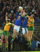 23 April 2000; Dara O'Sé and Donal Daly of Kerry in action against Nigel Craword, right, and John McDermott of Meath during the Church & General National Football League Division 1 Semi-Final match between Kerry and Meath at Semple Stadium in Thurles, Tipperary. Photo by Brendan Moran/Sportsfile