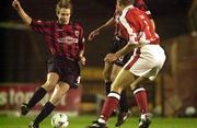 24 March 2000; Kevin Hunt of Bohemians in action against Paul Osam of St Patrick's Athletic during the Eircom League Premier Division match between Bohemians and St Patrick's Athletic at Dalymount Park in Dublin. Photo by David Maher/Sportsfile