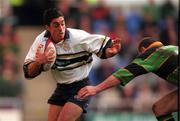 8 April 2000; Kieran Campbell of London Irish in action against Alan Bateman of Northampton during the Tetley's Bitter Cup Semi-Final match between London Irish and Northampton at the Madejski Stadium in Reading, England. Photo by Brendan Moran/Sportsfile