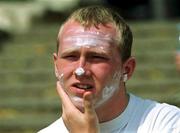 30 April 2000; Leonard Walker applies sun cream during a Republic of Ireland U16's training session at Kefar Silver Youth Village in Ashkelon, Israel. Photo by David Maher/Sportsfile