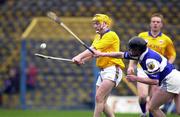 8 April 2000; Liam Cahill of Tipperary in action against Pat Mahon of Laois during the Church & General National Hurling League Division 1B Round 6 match between Tipperary and Laois at Semple Stadium in Thurles, Tipperary. Photo by Damien Eagers/Sportsfile