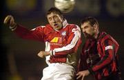 24 March 2000; Marcus Hallows of St Patrick's Athletic in action against Maurice O'Driscoll of Bohemians during the Eircom League Premier Division match between Bohemians and St Patrick's Athletic at Dalymount Park in Dublin. Photo by David Maher/Sportsfile
