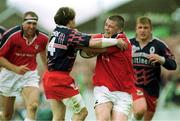 15 April 2000; Marcus Horan of Munster is tackled by Christophe Dominici of Stade Francais during the Heineken Cup Quarter-Final match between Munster and Stade Francais at Thomond Park in Limerick. Photo by Matt Browne/Sportsfile