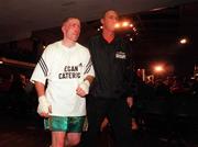 15 April 2000; Michael Carruth looks dejected on his return to the dressing room following defeat to Adrian Stone in their IBO Middleweight Championship title fight at York Hall in Bethnal Green, England. Photo by David Maher/Sportsfile