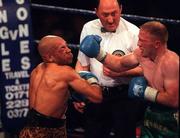 15 April 2000; Michael Carruth, right, and Adrian Stone during their IBO Middleweight Championship title fight at York Hall in Bethnal Green, England. Photo by David Maher/Sportsfile