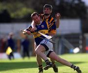 26 March 2000; Michael Ryan of Tipperary in action against Niall Moloney of Kilkenny during the Church & General National Hurling League Division 1B Round 4 match between Tipperary and Kilkenny at Semple Stadium in Thurles, Tipperary. Photo by Ray Lohan/Sportsfile