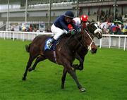 26 March 2000; Modigliani, with Michael Kinane up, on their way to winning the First Flier European Breeders Fund Maiden at The Curragh Racecourse in Newbridge, Kildare. Photo by Sportsfile