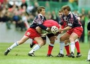 15 April 2000; Mike Mullins of Munster in action against Diego Dominguez, left, and Cliff Mytton of Stade Francais during the Heineken Cup Quarter-Final match between Munster and Stade Francais at Thomond Park in Limerick. Photo by Brendan Moran/Sportsfile