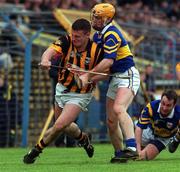 26 March 2000; Niall Moloney of Kilkenny in action against Paul Ormonde of Tipperary during the Church & General National Hurling League Division 1B Round 4 match between Tipperary and Kilkenny at Semple Stadium in Thurles, Tipperary. Photo by Ray Lohan/Sportsfile