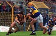 26 March 2000; Niall Moloney of Kilkenny in action against Paul Ormonde of Tipperary during the Church & General National Hurling League Division 1B Round 4 match between Tipperary and Kilkenny at Semple Stadium in Thurles, Tipperary. Photo by Ray Lohan/Sportsfile