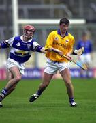 8 April 2000; Noel Morris of Tipperary in action against Fionan O'Sullivan of Laois during the Church & General National Hurling League Division 1B Round 6 match between Tipperary and Laois at Semple Stadium in Thurles, Tipperary. Photo by Damien Eagers/Sportsfile