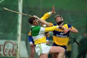2 April 2000; Michael Duignan of Offaly in action against  Brian Forde of Clare during the Church & General National Hurling League Division 1A Round 5 match between Offaly and Clare at St Brendan's Park in Birr, Offaly. Photo by Damien Eagers/Sportsfile