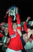 7 April 2000; Pat Scully of Shelbourne lifts the trophy following the Eircom League Premier Division match between Waterford United and Shelbourne at Regional Sports Centre in Waterford. Photo by Matt Browne/Sportsfile