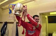 7 April 2000; Pat Scully of Shelbourne celebrates with the trophy following the Eircom League Premier Division match between Waterford United and Shelbourne at Regional Sports Centre in Waterford. Photo by David Maher/Sportsfile
