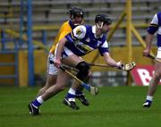 8 April 2000; Paul Cuddy of Laois in action against Mark O'Leary of Tipperary during the Church & General National Hurling League Division 1B Round 6 match between Tipperary and Laois at Semple Stadium in Thurles, Tipperary. Photo by Ray McManus/Sportsfile