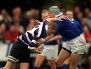 15 April 2000; Peter O'Malley of Terenure is tackled by Malcolm O'Kelly of St Mary's College during the AIB All-Ireland League Division 1 match between Terenure and St Mary's College at Lakelands Park in Terenure, Dublin. Photo by Damien Eagers/Sportsfile