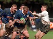 29 April 2000; Victor Costello of St Mary's is tackled by Brian O' Meara, left, and Ronan O'Gara of Cork Constitution during the AIB All-Ireland League Division 1 match between St Mary's and Cork Constitution at Templeville Road in Dublin. Photo by Matt Browne/Sportsfile