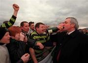 30 March 2000; An Taoiseach Bertie Ahern T.D., celebrates with Shamrock Rovers fans after he tossed the first sod at Shamrock Rovers new home stadium in Tallaght, Dublin. Photo by David Maher/Sportsfile