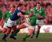4 March 2000; Simon Easterby of Ireland is tackled by Luca Martin of Italy during the Lloyds TSB 6 Nations match between Ireland and Italy at Lansdowne Road in Dublin. Photo by Matt Browne/Sportsfile