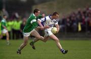 13 April 2000; Stephen Barron of Waterford is tackled by  Tommy Stack of Limerick during the Munster Under-21 Football Championship Final match between Waterford and Limerick at Fraher Field in Dungarvan, Waterford. Photo by Matt Browne/Sportsfile