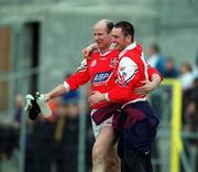 23 April 2000; Stephen Melia, left and Denis Reilly of Louth celebrate following the Church & General National Football League Division 2 Semi-Final match between Louth and Laois at Cusack Park in Mullingar, Westmeath. Photo by Aoife Rice/Sportsfile