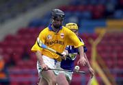 8 April 2000; Thomas Dunne of Tipperary in action against Cyril Cuddy of Laois during the Church & General National Hurling League Division 1B Round 6 match between Tipperary and Laois at Semple Stadium in Thurles, Tipperary. Photo by Ray McManus/Sportsfile
