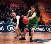 9 February 2000; Tim Dempsey of Colaiste Mhuire Crosshaven in action against Mark McEvoy of Carrick-on-Shannon CS during the Bank of Ireland Schools Cup Boys' C Final match between Colaiste Mhuire Crosshaven and Carrick-On-Shannon CS at National Basketball Arena in Tallaght, Dublin. Photo by Brendan Moran/Sportsfile