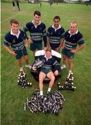 6 October 1999; Australia's Tim Horan sits in an inflatable chair with team-mates, from left, Jason Little, John Eales, Toutai Kefu and Richard Harry at a squad training session in Portmarnock after he broke the Guinness try challenge during their game against Romania. Tim scored Australia's first try in under 119.5 seconds, the time it takes to pour the perfect pint of Guinness. As a result, Tim received a year's supply of Guinness and there was a £10,000 donation to the charity of Tim's choice. Photo by Brendan Moran/Sportsfile