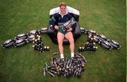 6 October 1999; Australia's Tim Horan sits in an inflatable chair at a squad training session in Portmarnock after he broke the Guinness try challenge during their game against Romania. Tim scored Australia's first try in under 119.5 seconds, the time it takes to pour the perfect pint of Guinness. As a result, Tim received a year's supply of Guinness and there was a £10,000 donation to the charity of Tim's choice. Photo by Brendan Moran/Sportsfile