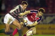 7 April 2000; Tom Tierney of Munster is tackled by James Grindall of Leicester Tigers during the friendly match between Leicester Tigers and Munster at Welford Road in Leicester, England. Photo by Brendan Moran/Sportsfile