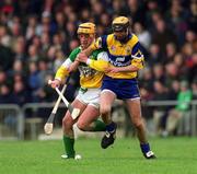 2 April 2000; Niall Claffey of Offaly in action against Tony Griffin of Clare during the Church & General National Hurling League Division 1A Round 5 match between Offaly and Clare at St Brendan's Park in Birr, Offaly. Photo by Aoife Rice/Sportsfile